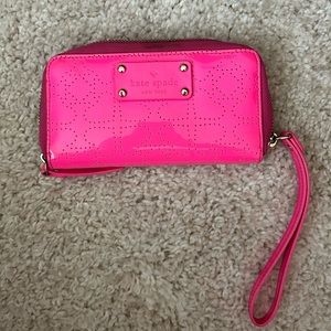 The Kate Spade Metro Spade Jazzy Zip-around Wristlet
Wallet.